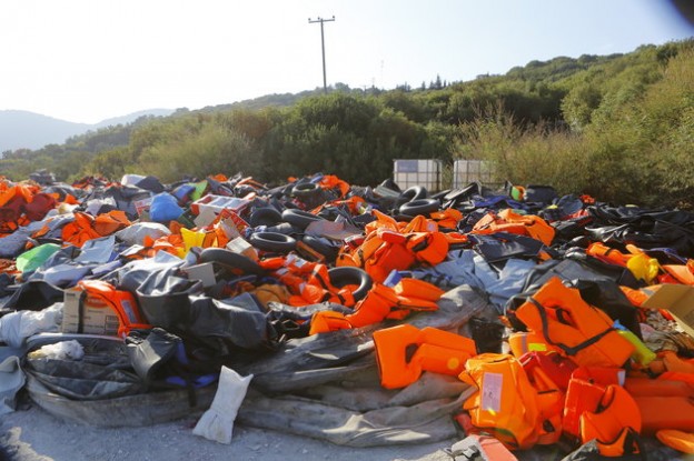 LESBOS, NORTH AEGEAN, GREECE - 2015/09/09: A huge pile of life jackets, other inflatable devices and inflatable rubber dinghies that were used by the refugees coming ashore. Hundreds of refugees, mainly from Syria, Iraq and Afghanistan are still coming to the Greek island of Lesbos on a daily basis, after making the dangerous trip from the nearby Turkish coast in small inflatable boats. (Photo by Michael Debets/Pacific Press/LightRocket via Getty Images)