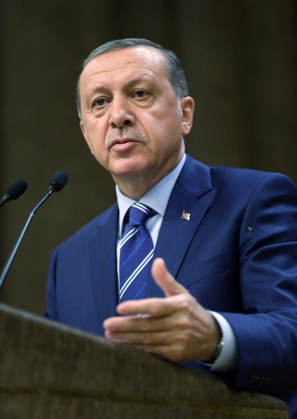 Turkish President Recep Tayyip Erdogan delivers a speech to a group of export businessmen in Ankara, on Wednesday, Aug. 10, 2016. Erdogan has called on a group of businessmen to inform authorities about anyone they suspect of being a follower of a U.S.-based Muslim cleric accused of orchestrating Turkey's failed July 15 coup. (Presidential Press Service via AP)