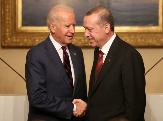 U.S. Vice President Joe Biden, left, and Turkish President Recep Tayyip Erdogan shake hands after a joint news conference in Istanbul, Turkey, Saturday, Nov. 22, 2014. Biden on Friday became the latest in a parade of U.S. officials trying to push Turkey to step up its role in the international coalition's fight against Islamic State extremists. (AP Photo/Emrah Gurel)